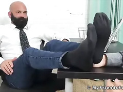Bald bearded hunk foot worshipped and licked by young lad